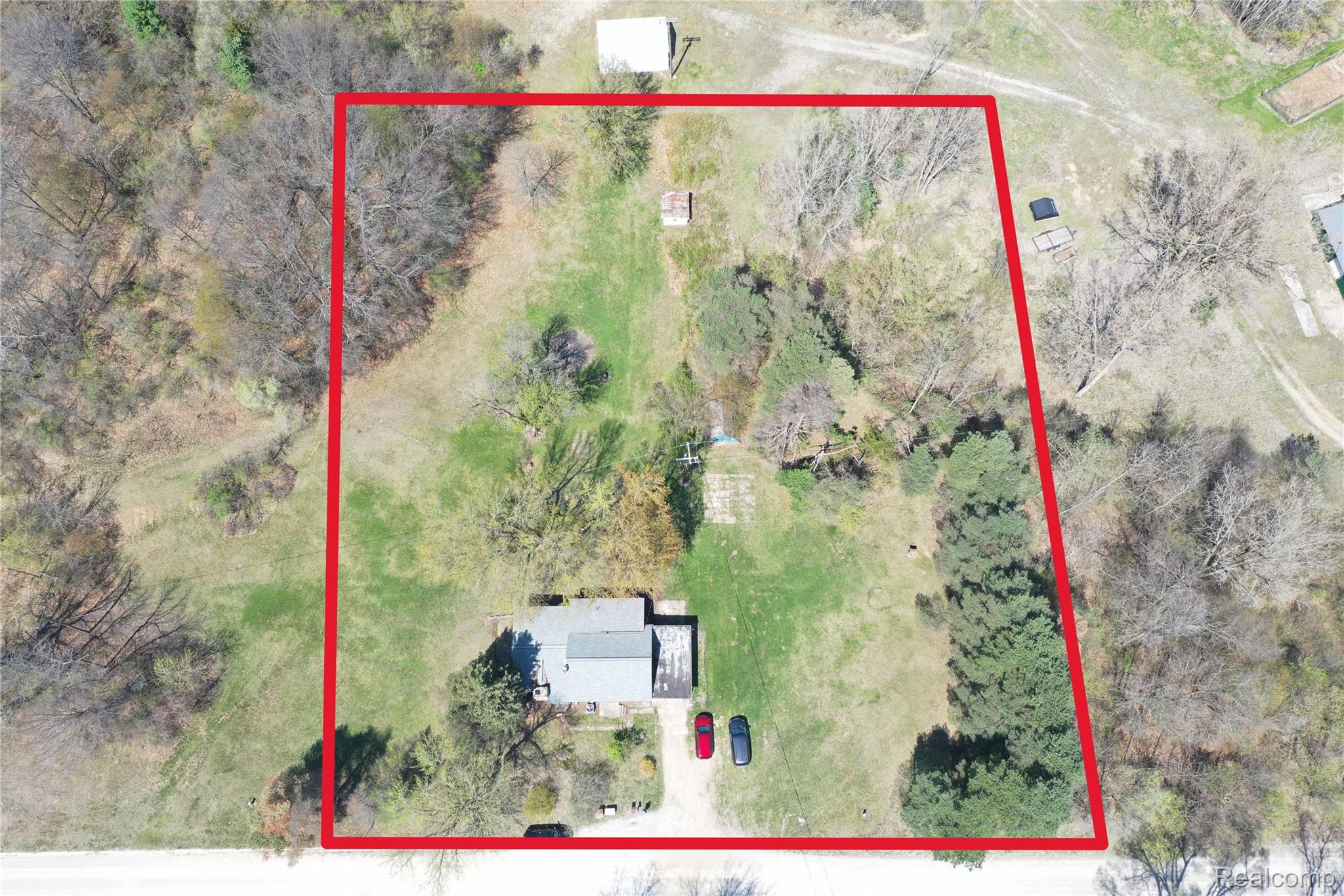 1325 Barnes Lake Road North Branch, MI 48461 - Photo 4 of 42 Aerial view of property's location featuring property boundaries highlighted