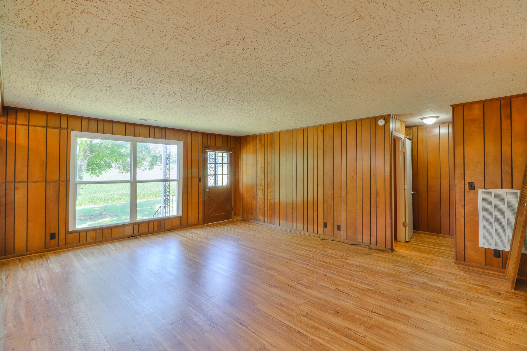 3308 Craig Bridge Road Williamsport, TN 38487 - Photo 11 of 45 a view of empty room with wooden floor and fan