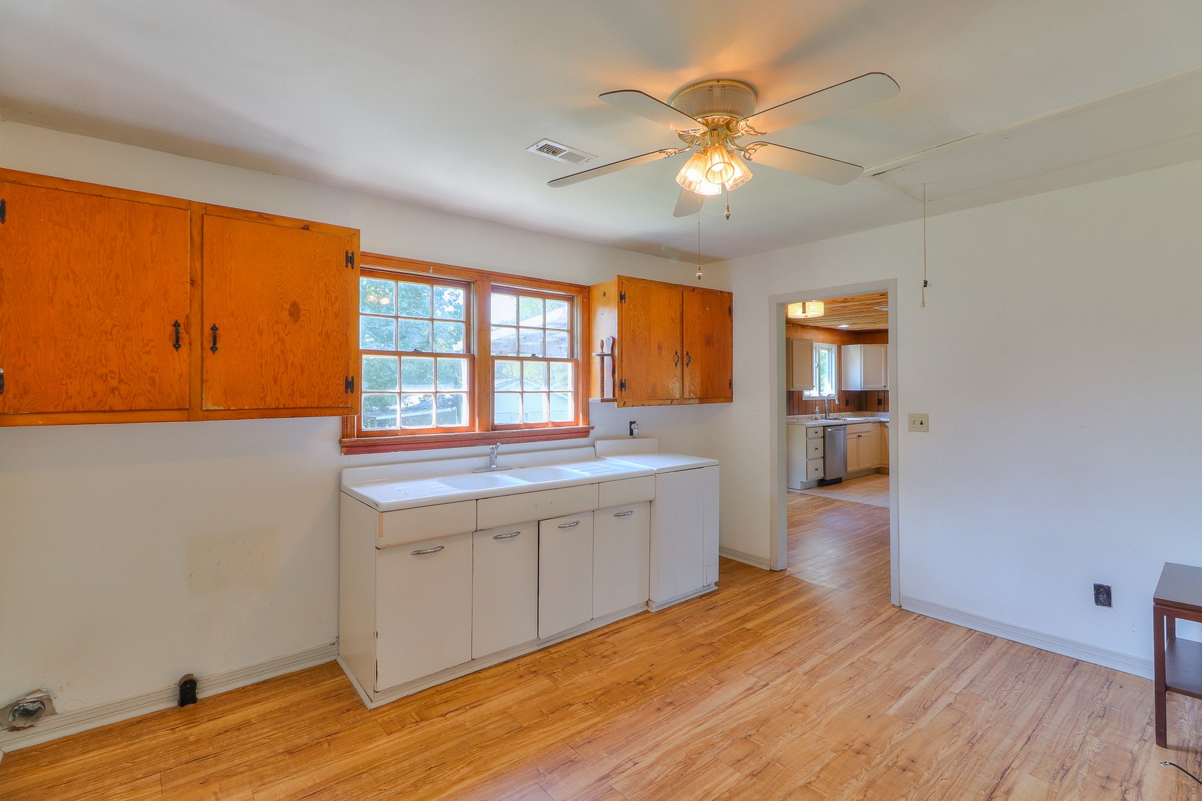 3308 Craig Bridge Road Williamsport, TN 38487 - Photo 13 of 45 wooden floor in an empty room with a window
