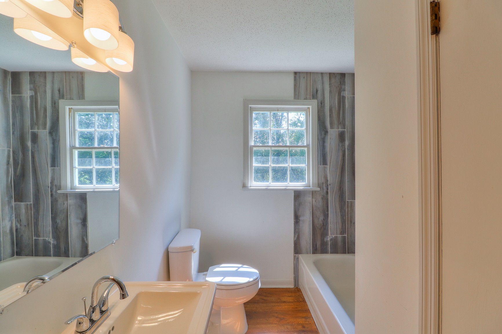 3308 Craig Bridge Road Williamsport, TN 38487 - Photo 14 of 45 a bath room with a sink