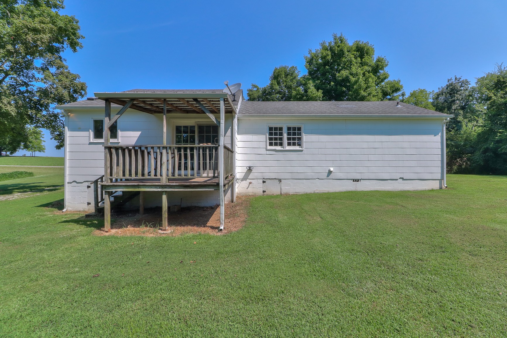 3308 Craig Bridge Road Williamsport, TN 38487 - Photo 31 of 45 a front view of a house with garden