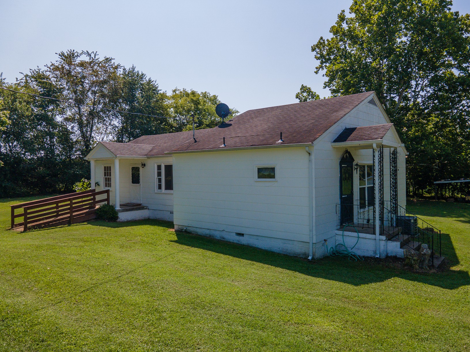 3308 Craig Bridge Road Williamsport, TN 38487 - Photo 43 of 45 a view of a house with backyard and sitting area