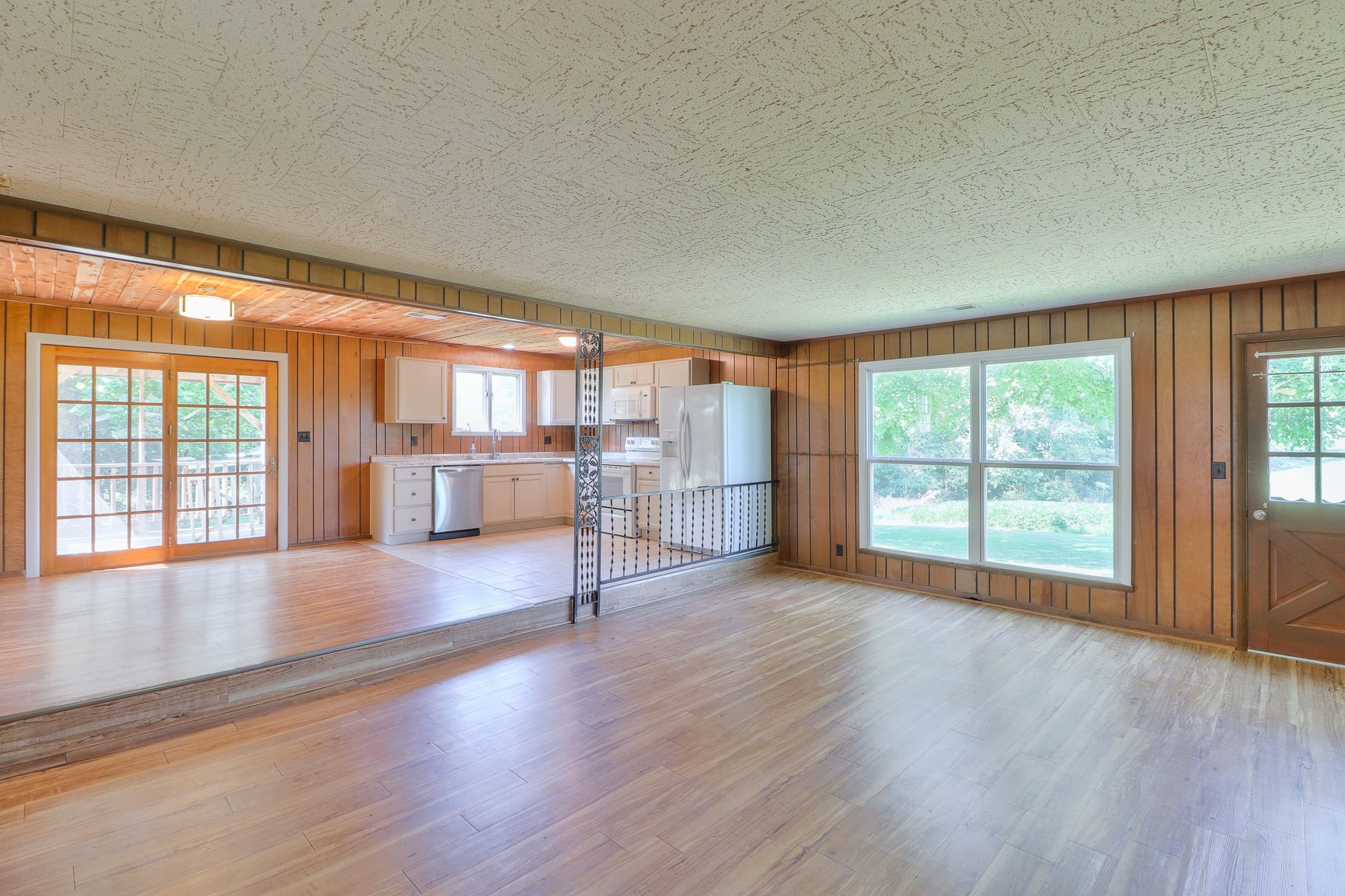 3308 Craig Bridge Road Williamsport, TN 38487 - Photo 6 of 45 a view of an empty room with wooden floor and a window