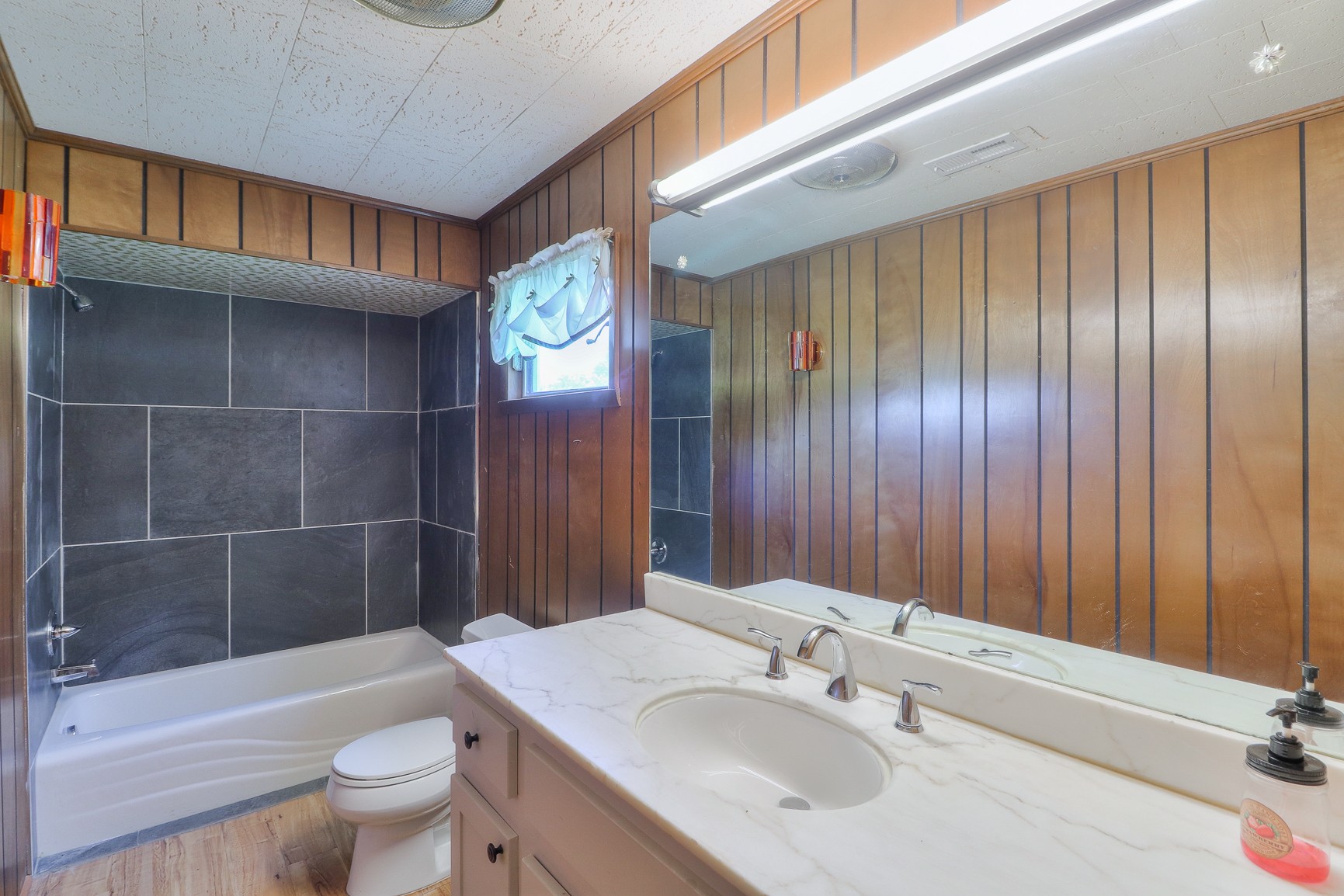 3308 Craig Bridge Road Williamsport, TN 38487 - Photo 7 of 45 a bathroom with a sink a toilet and shower