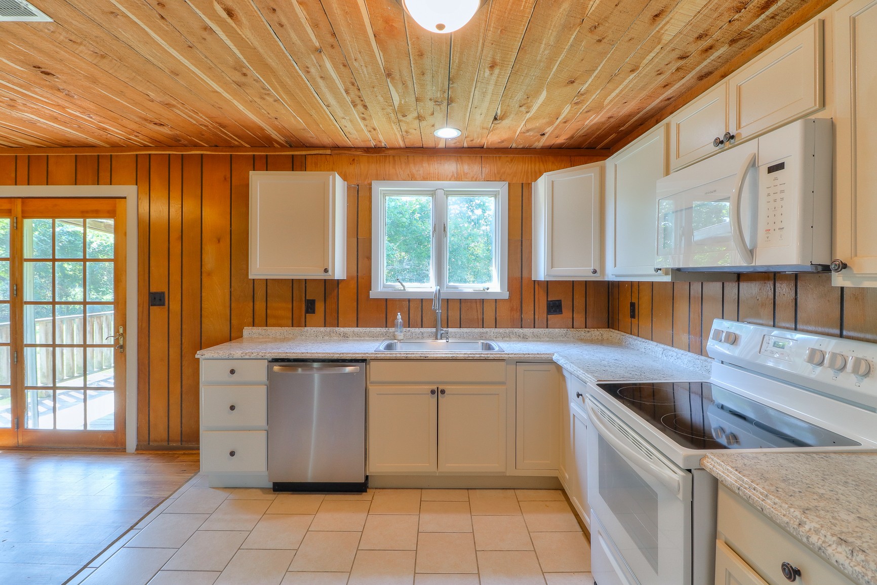 3308 Craig Bridge Road Williamsport, TN 38487 - Photo 9 of 45 a kitchen with a sink stove and cabinets