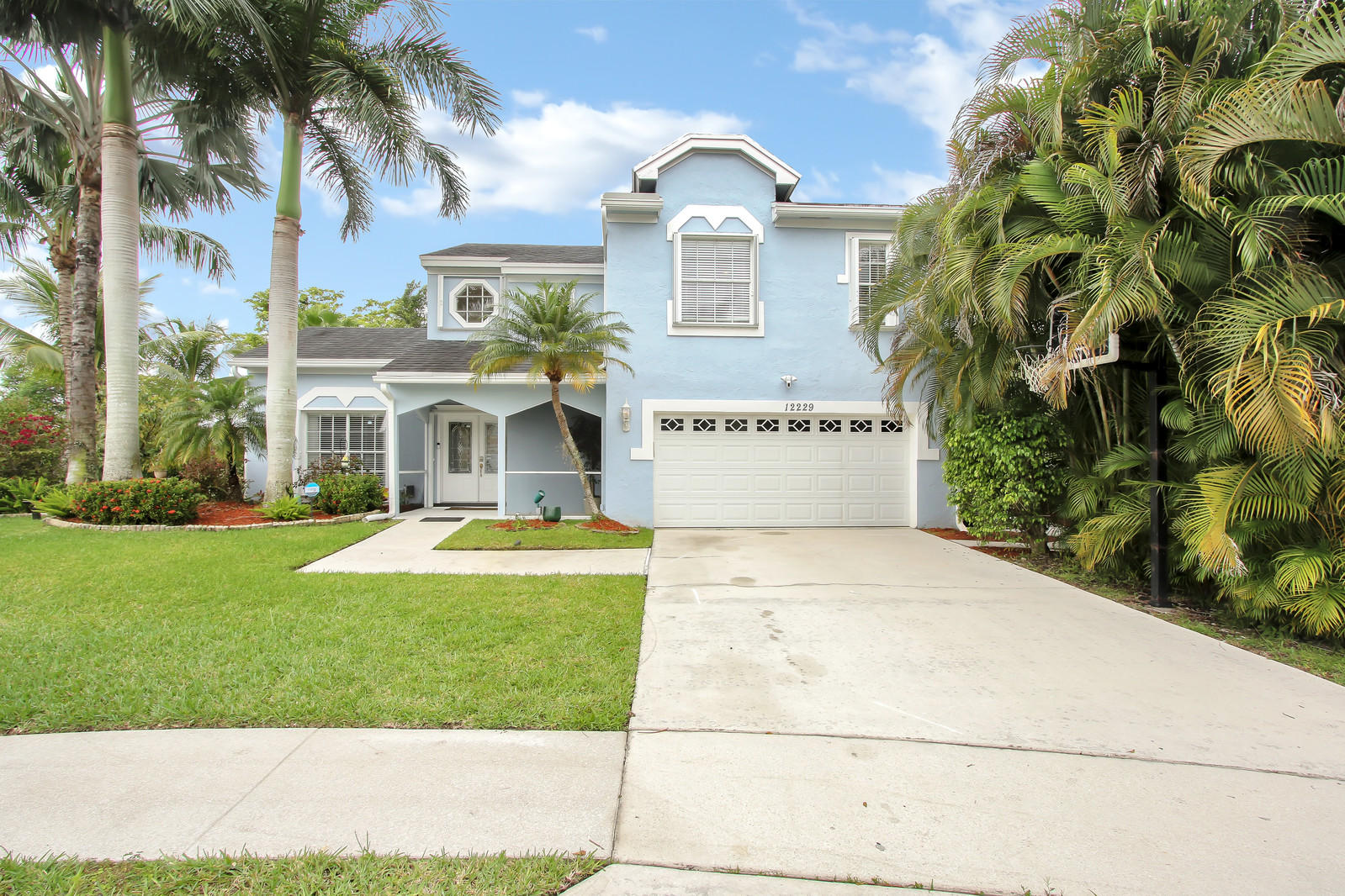 12229 Quilting Lane Boca Raton, FL 33428 - Photo 1 of 22 Front elevation