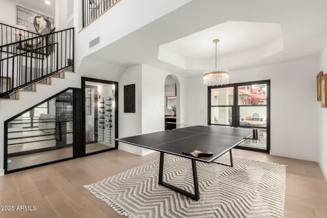 a living room with furniture and a table
