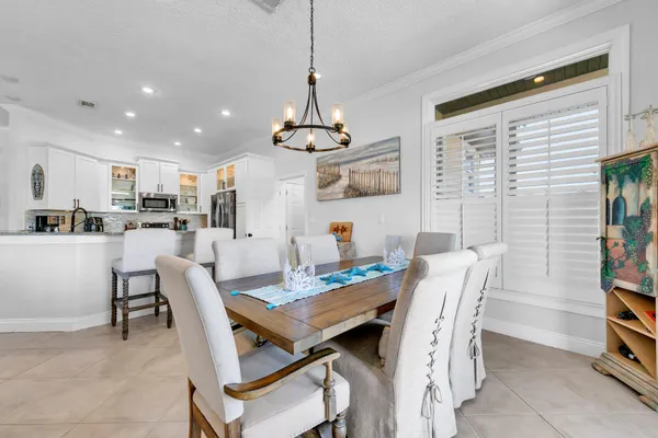 a kitchen with granite countertop a sink and cabinets