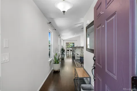 wooden floor in kitchen with windows