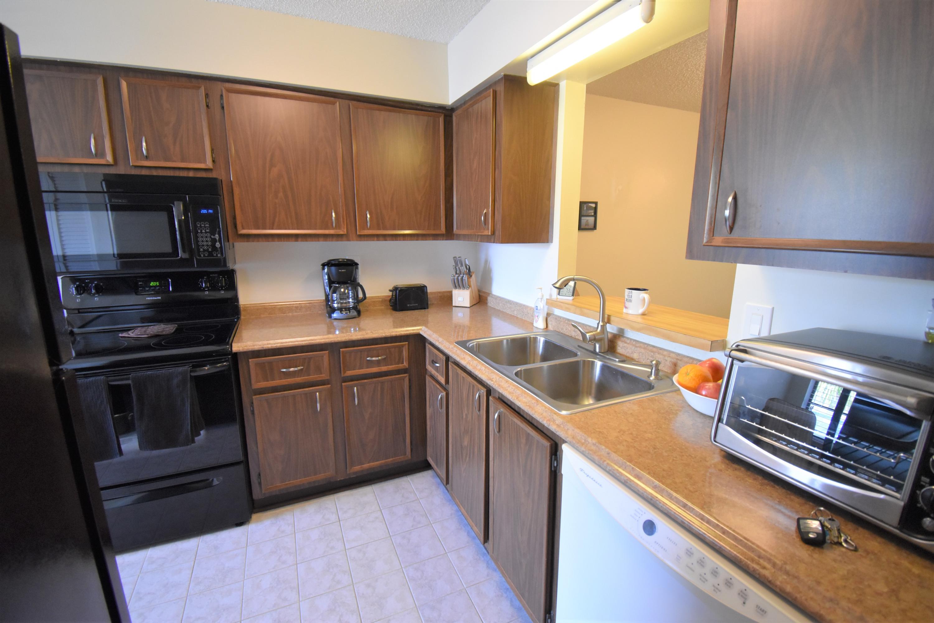 6008 Indrio Road, Unit 5 Fort Pierce, FL 34951 - Photo 5 of 39 Kitchen 3