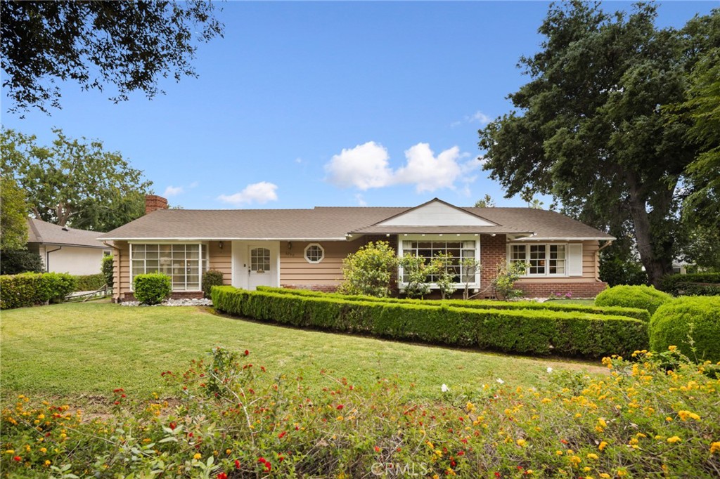 3750 Greenhill Road Pasadena, CA 91107 - Photo 1 of 1 a front view of a house with a yard