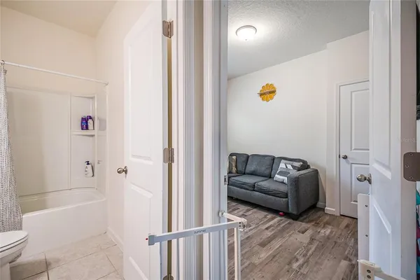 a en suite bathroom with a tub and a shower