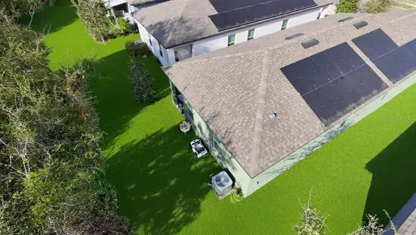 a view of a backyard with plants