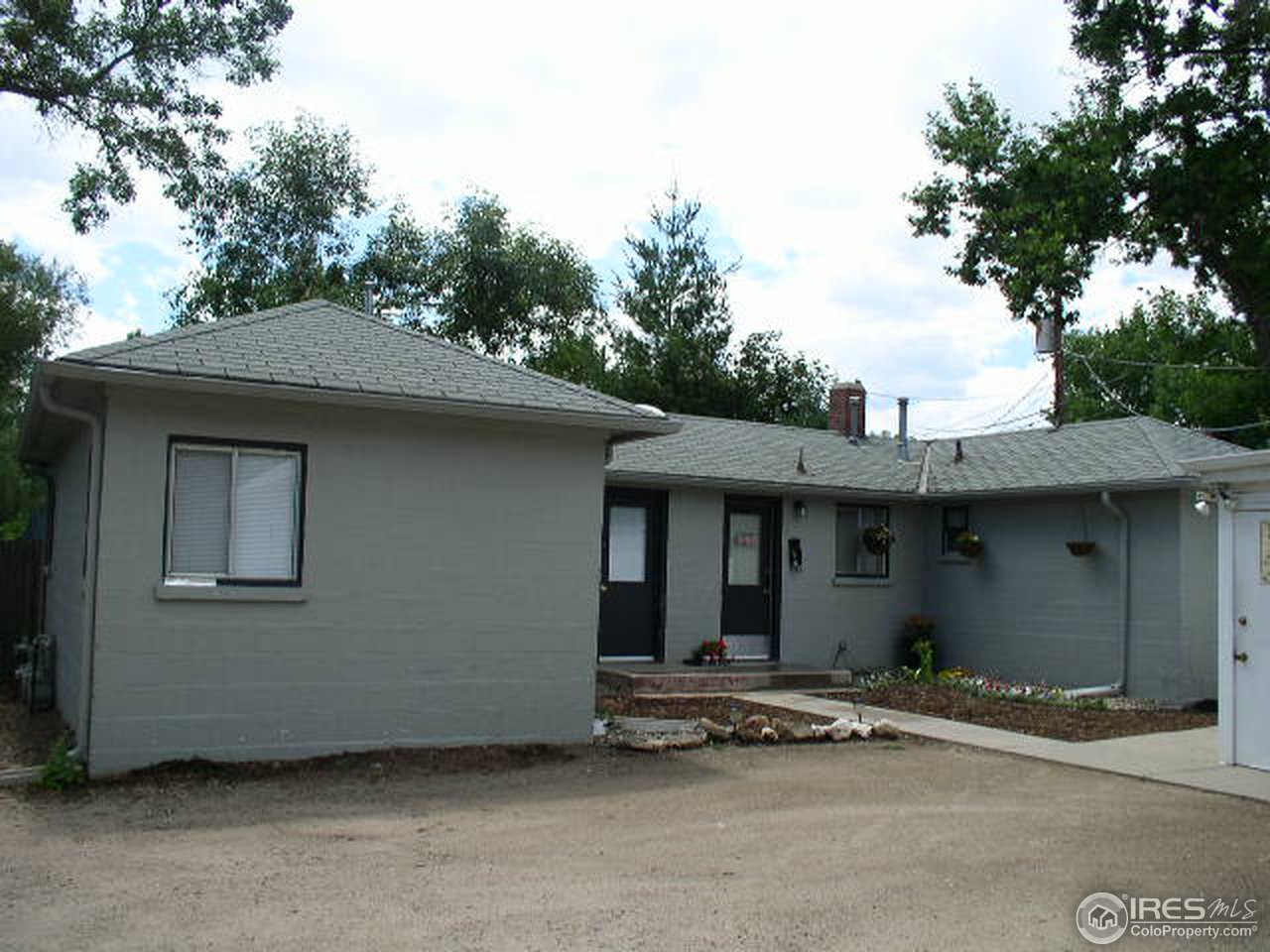 104 West Baseline Road Lafayette, CO 80026 - Photo 1 of 16 a view of a house with a patio