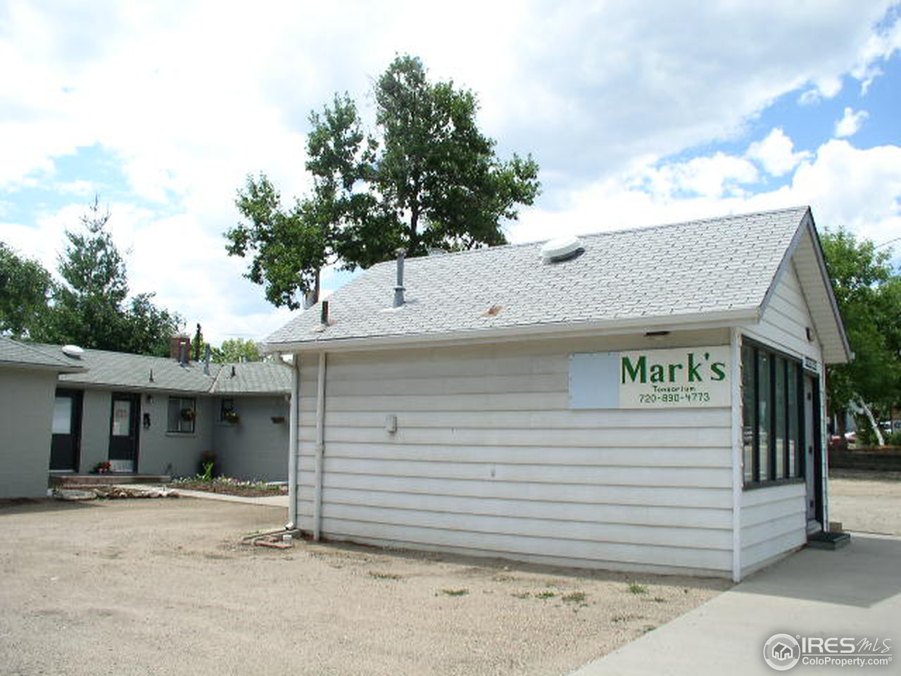 104 West Baseline Road Lafayette, CO 80026 - Photo 5 of 16 a front view of a house with a garage