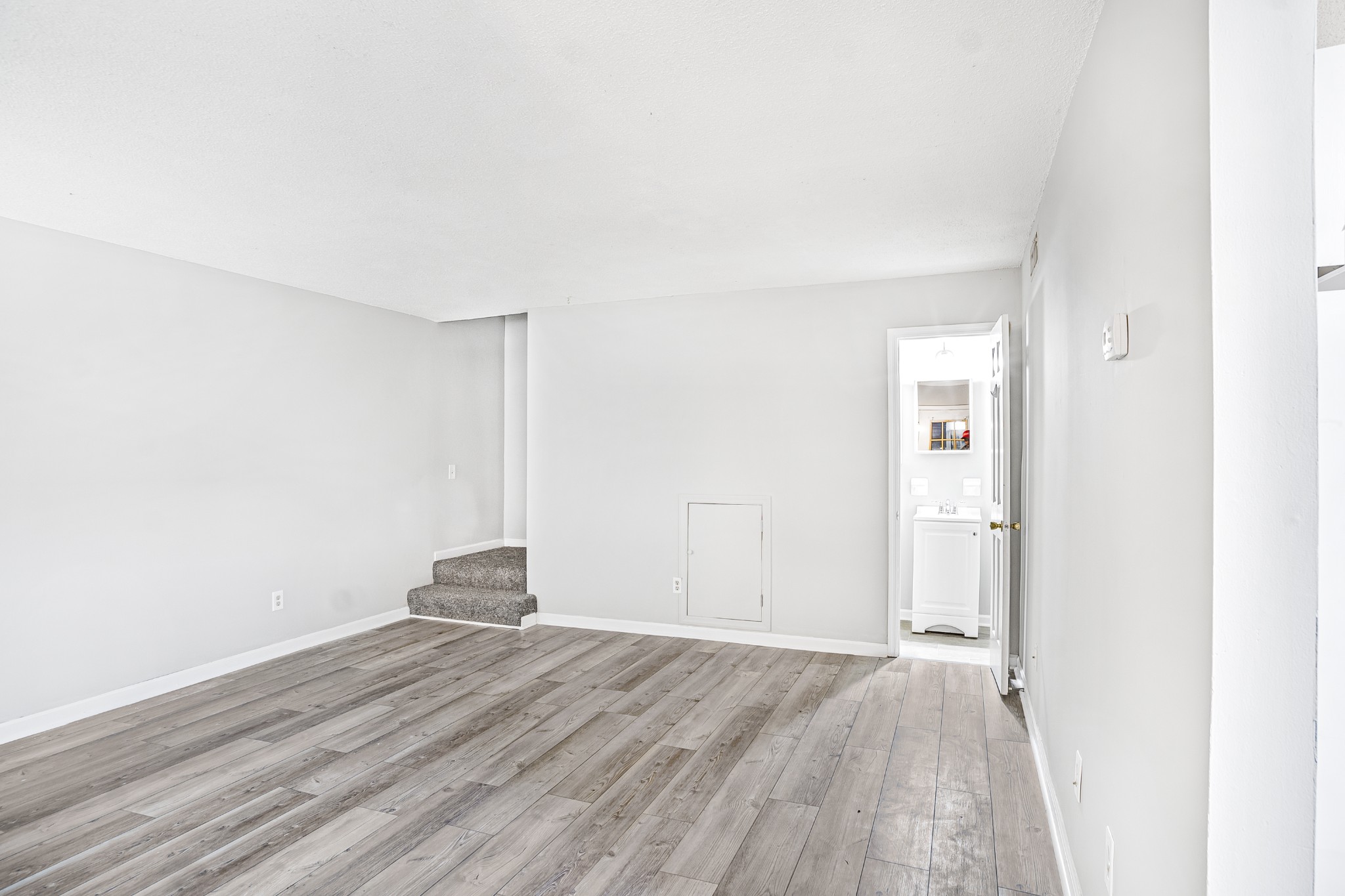 1301 Neelys Bend Road, Unit 9 Madison, TN 37115 - Photo 21 of 21 a view of empty room with wooden floor