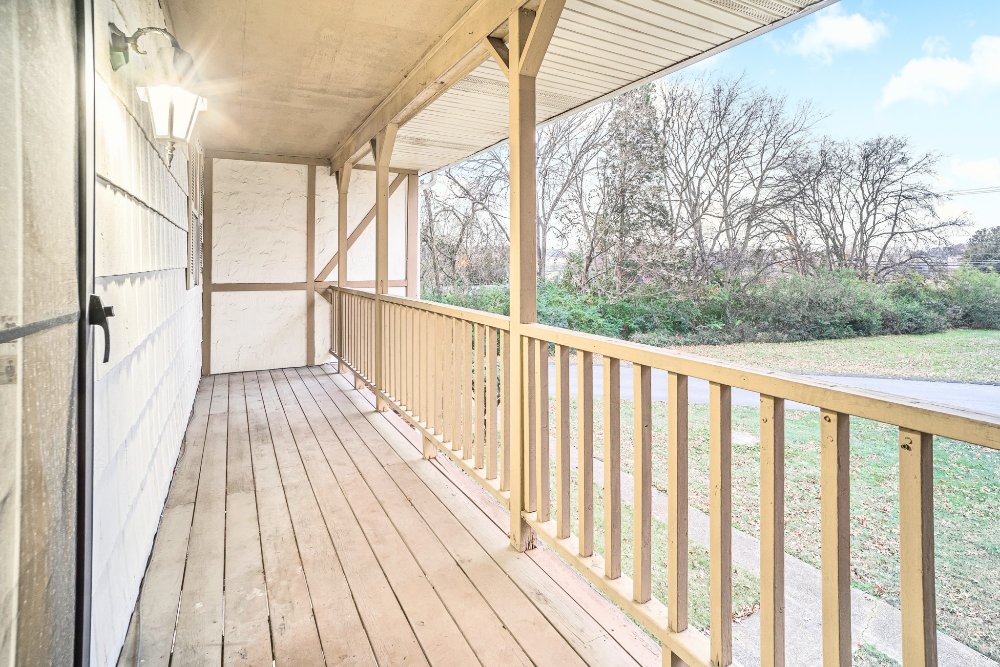 1301 Neelys Bend Road, Unit 9 Madison, TN 37115 - Photo 3 of 21 a view of balcony with wooden floor