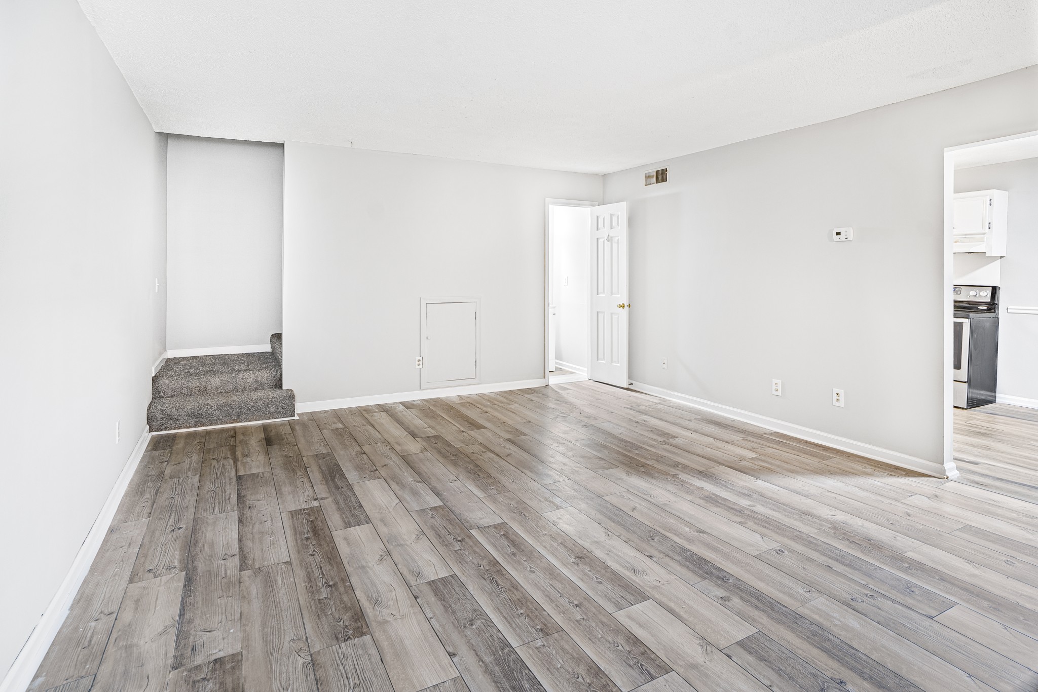 1301 Neelys Bend Road, Unit 9 Madison, TN 37115 - Photo 7 of 21 a view of a room with wooden floor