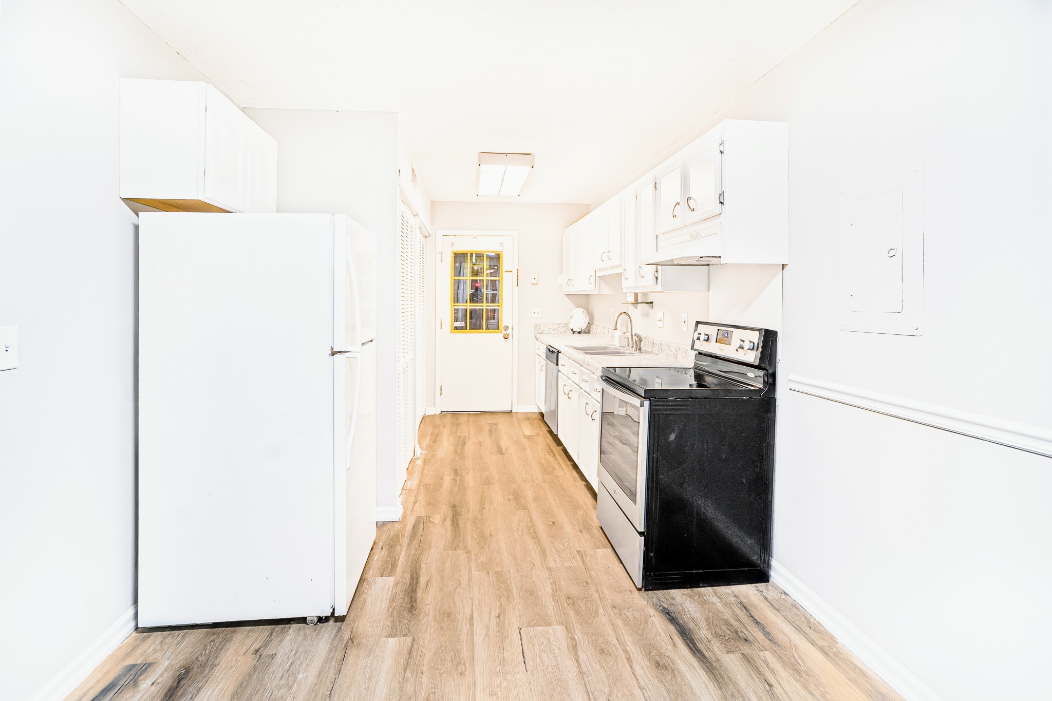 1301 Neelys Bend Road, Unit 9 Madison, TN 37115 - Photo 9 of 21 a view of kitchen with wooden floor