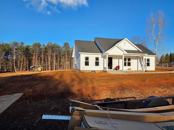 a view of house with outdoor space