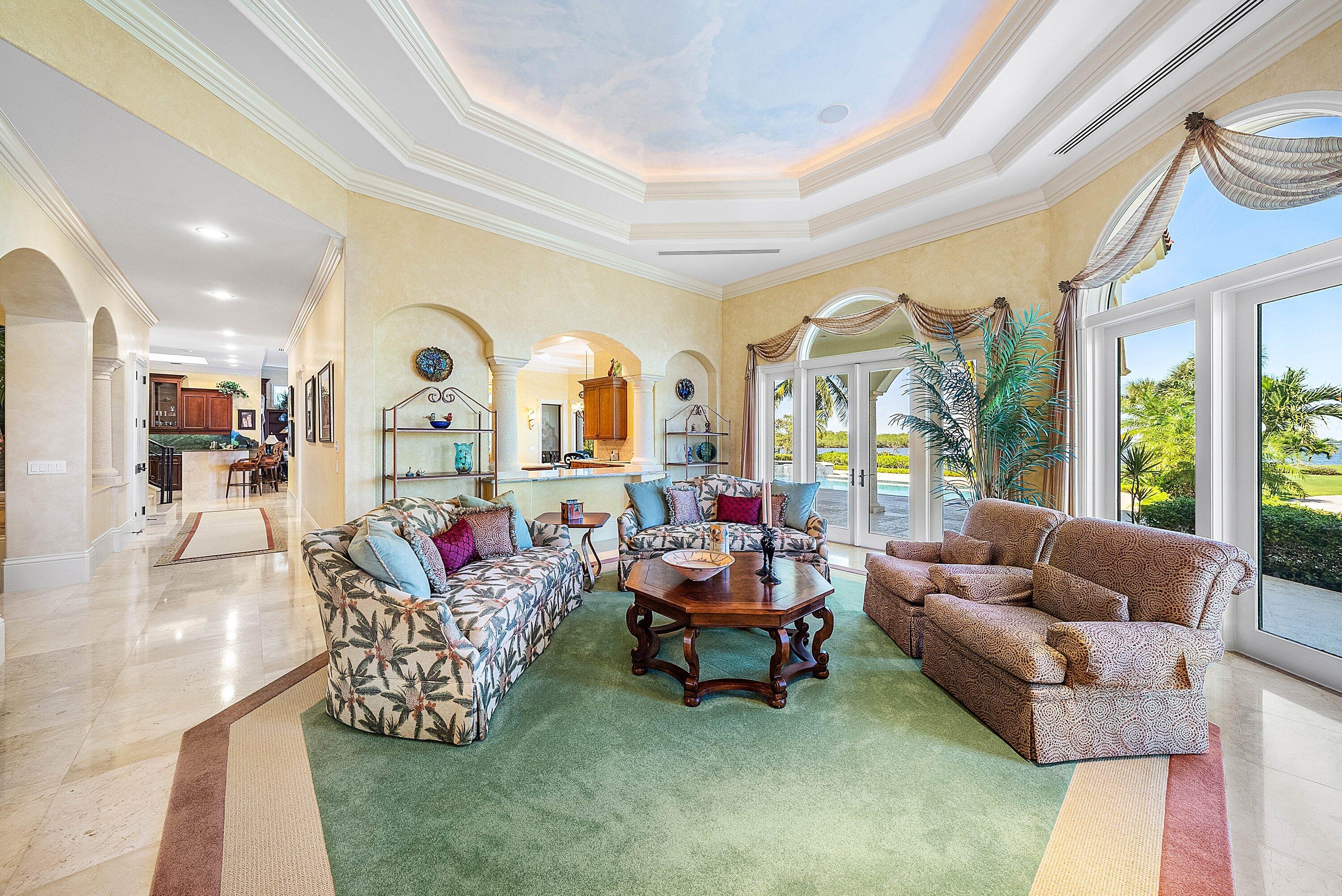 6381 Southeast Harbor Circle Stuart, FL 34996 - Photo 18 of 102 a living room with furniture and a large window