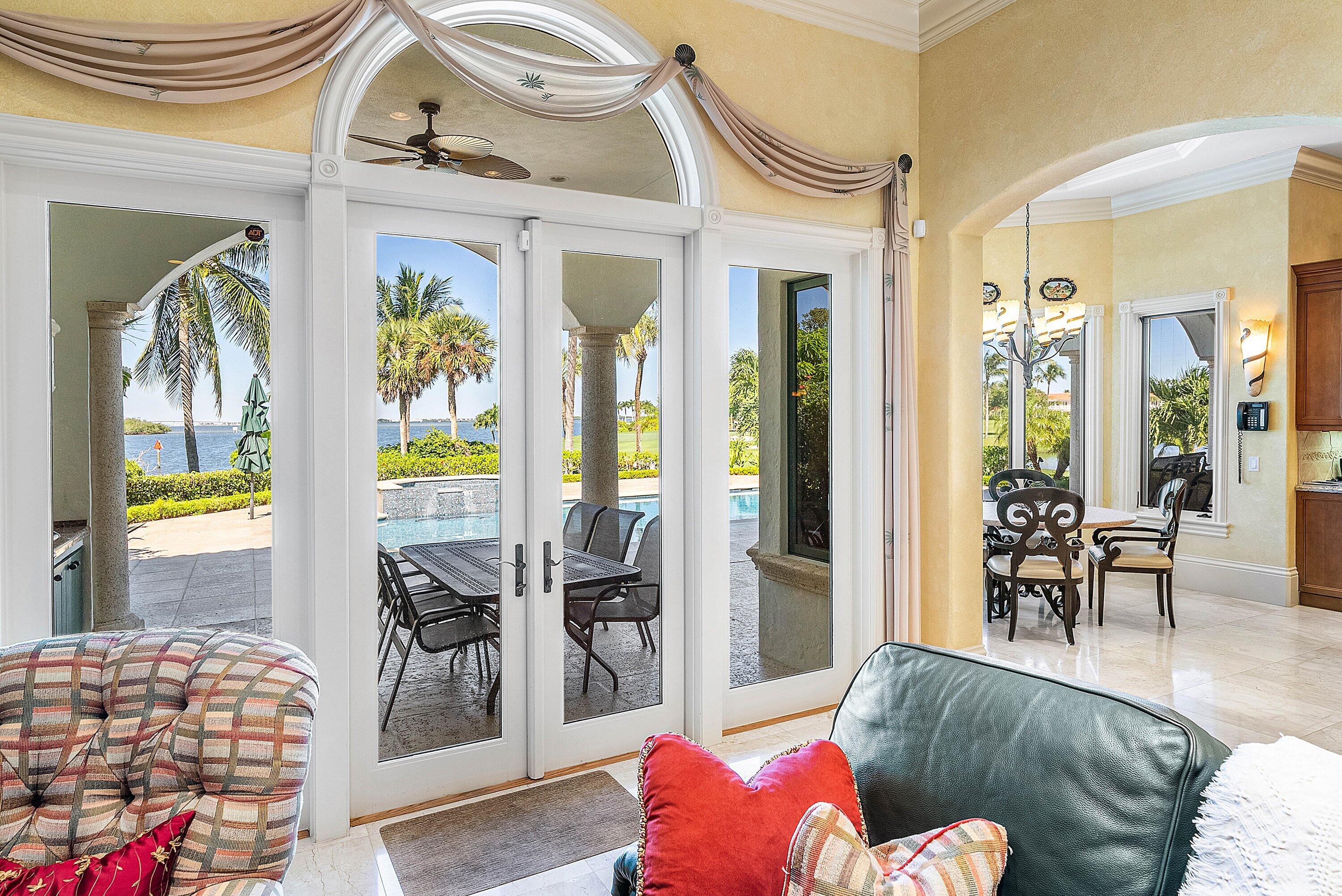 6381 Southeast Harbor Circle Stuart, FL 34996 - Photo 31 of 102 a living room with furniture and a table
