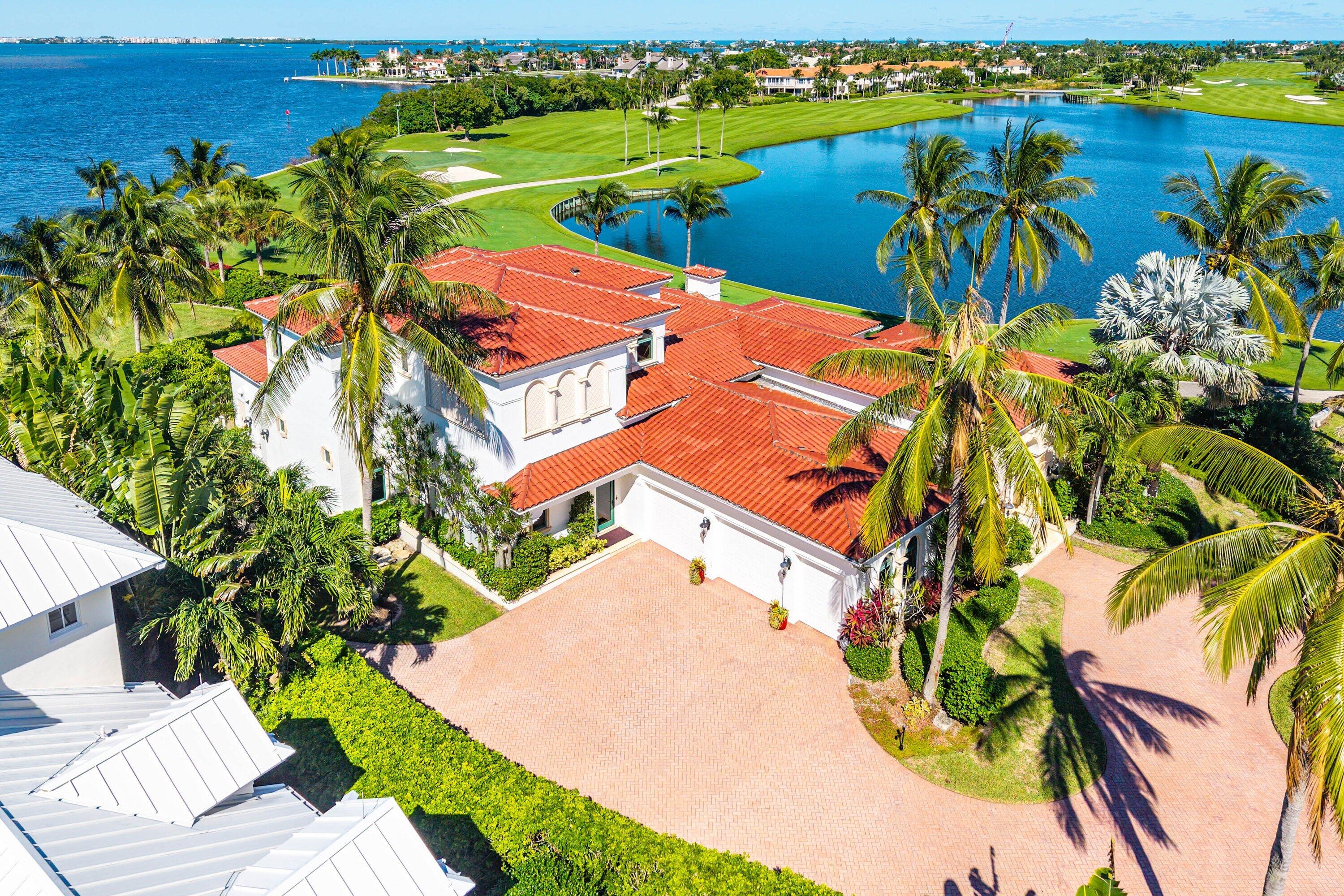 6381 Southeast Harbor Circle Stuart, FL 34996 - Photo 92 of 102 an aerial view of a house with a swimming pool yard and outdoor seating