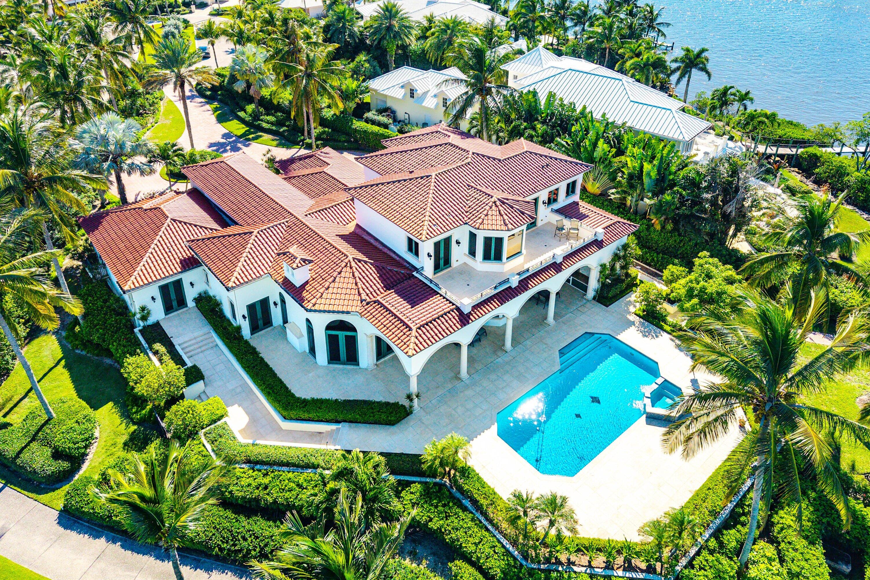 6381 Southeast Harbor Circle Stuart, FL 34996 - Photo 94 of 102 an aerial view of a house with a garden