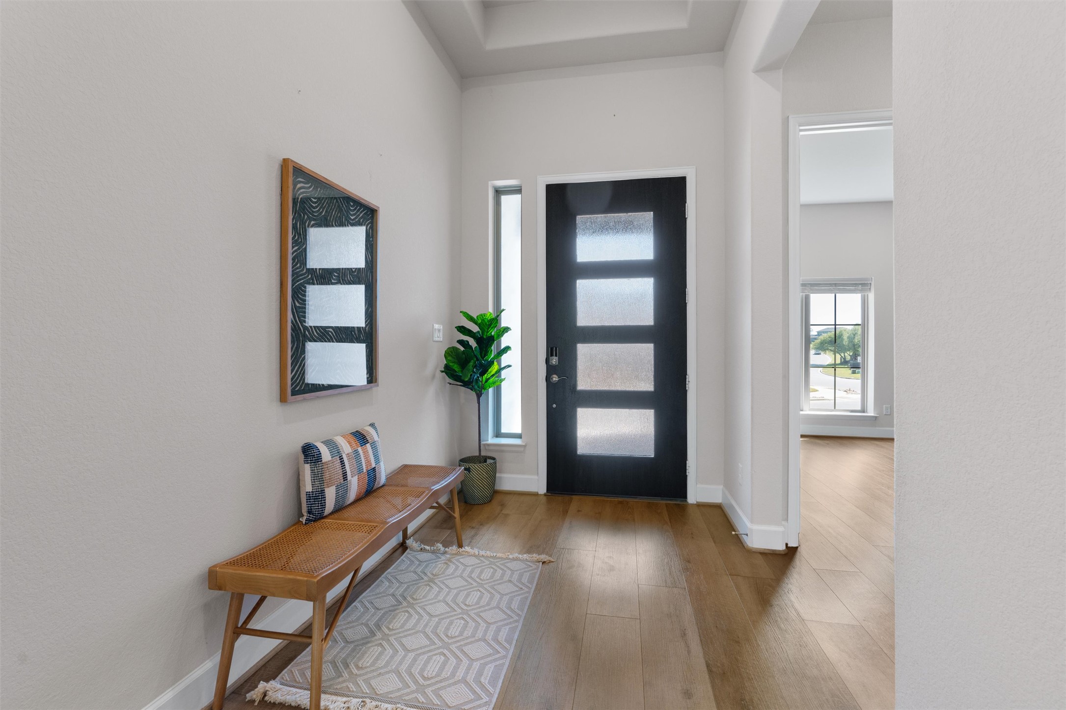 101 Pienza Drive Georgetown, TX 78628 - Photo 10 of 40 wooden floor and windows in a room