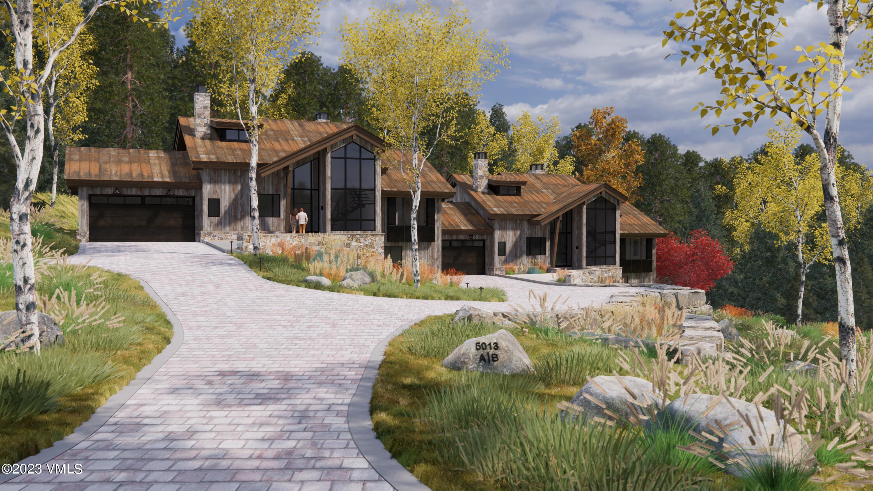 5013 Snowshoe Lane, Unit SOUTH Vail, CO 81657 - Photo 1 of 13 a view of a house with a yard
