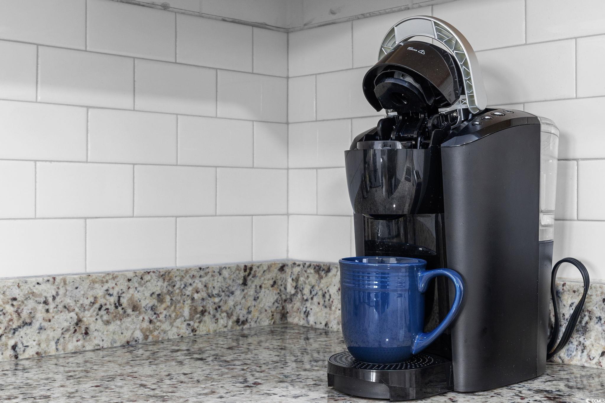 409 17th Avenue North, Unit 1 Myrtle Beach, SC 29577 - Photo 11 of 26 Kitchen view of a sink