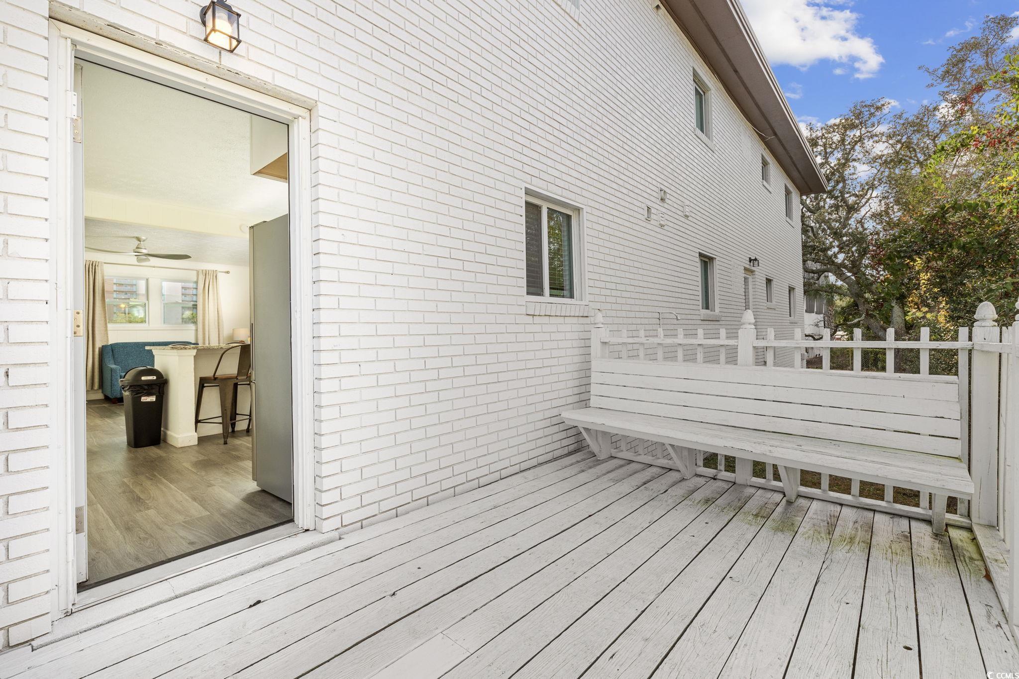 409 17th Avenue North, Unit 1 Myrtle Beach, SC 29577 - Photo 26 of 26 View of wooden terrace