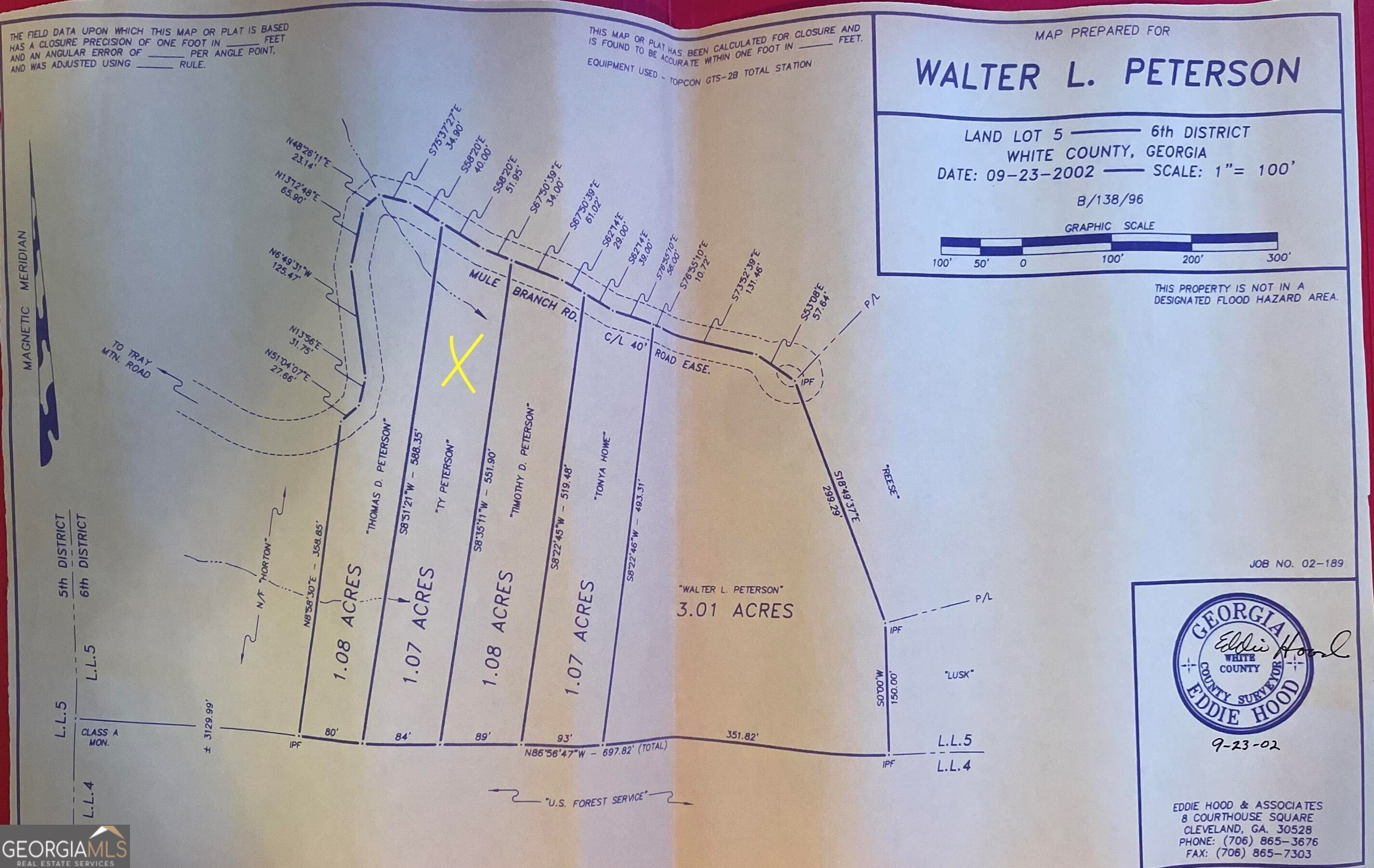 a view of storage and utility room with racks on the wall