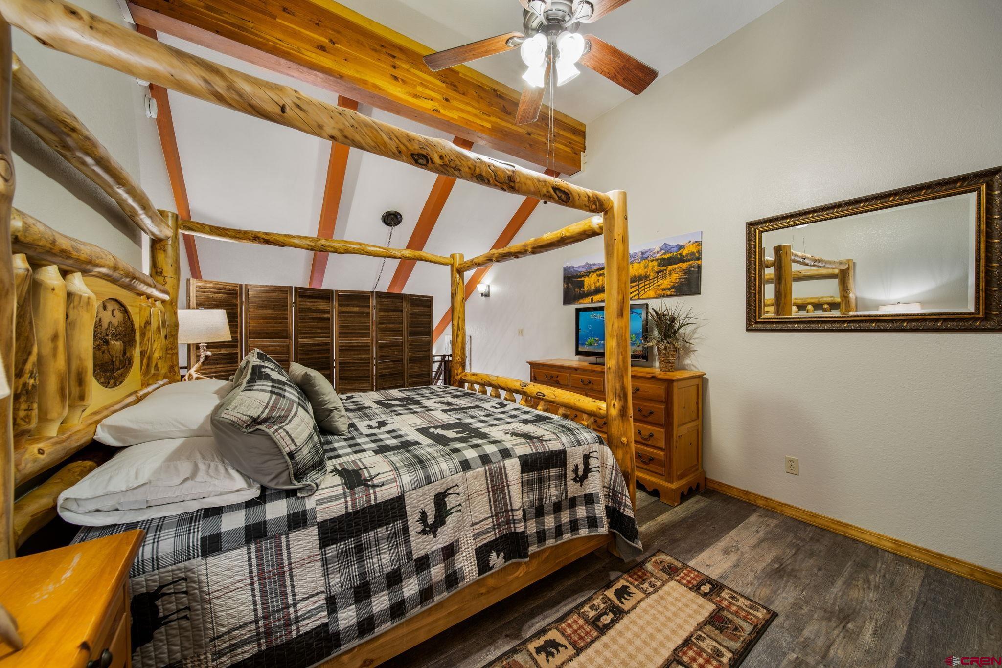 50827 Highway 550, Unit 324 Durango, CO 81301 - Photo 16 of 19 a bedroom with a bed and a window