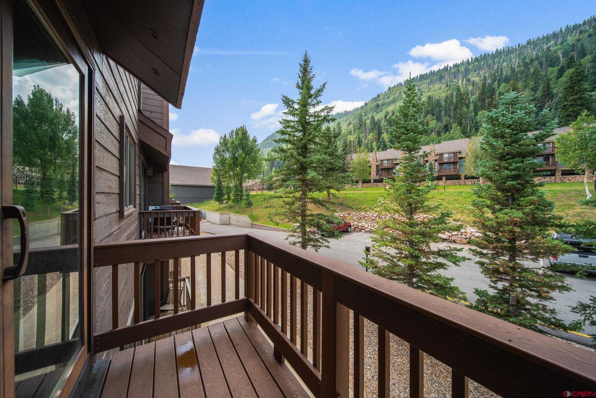 50827 Highway 550, Unit 324 Durango, CO 81301 - Photo 17 of 19 a view of a balcony with wooden floor