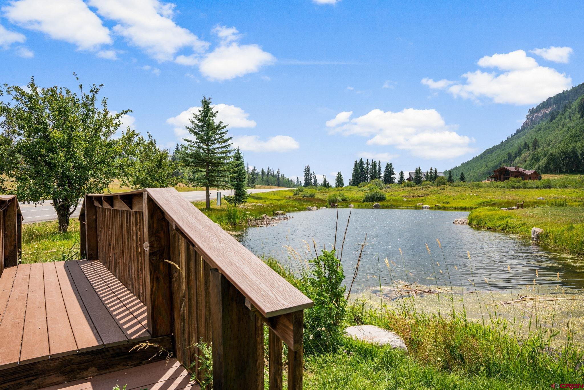 50827 Highway 550, Unit 324 Durango, CO 81301 - Photo 19 of 19 a view of a lake with a garden
