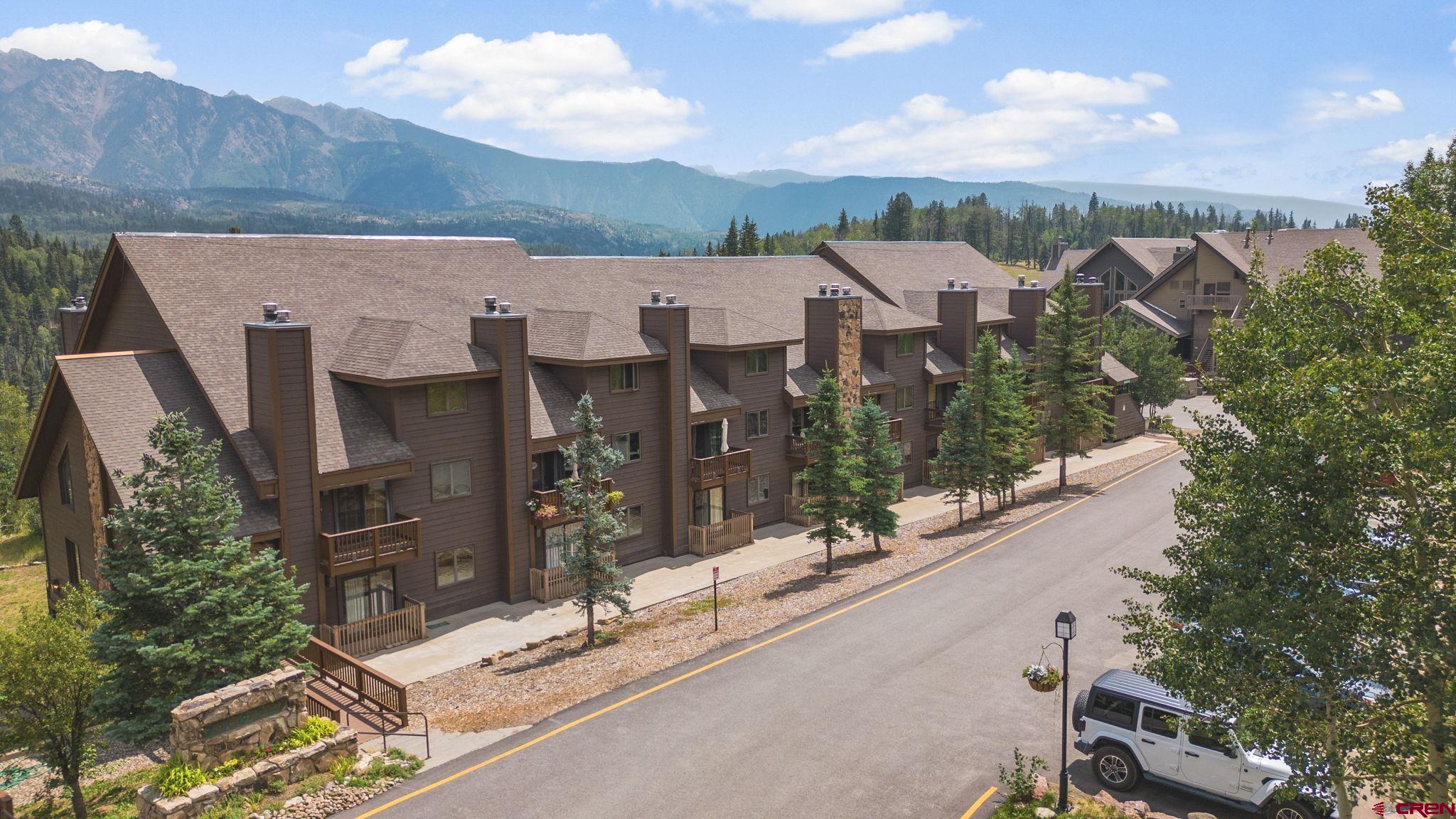 50827 Highway 550, Unit 324 Durango, CO 81301 - Photo 4 of 19 an aerial view of a house with a yard and large tree