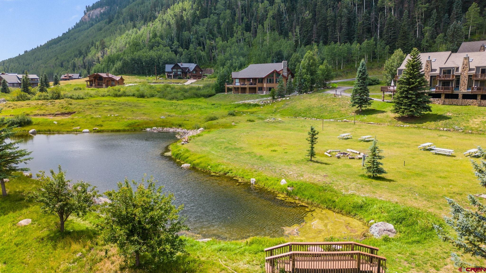 50827 Highway 550, Unit 324 Durango, CO 81301 - Photo 7 of 19 a swimming pool with some trees in the background