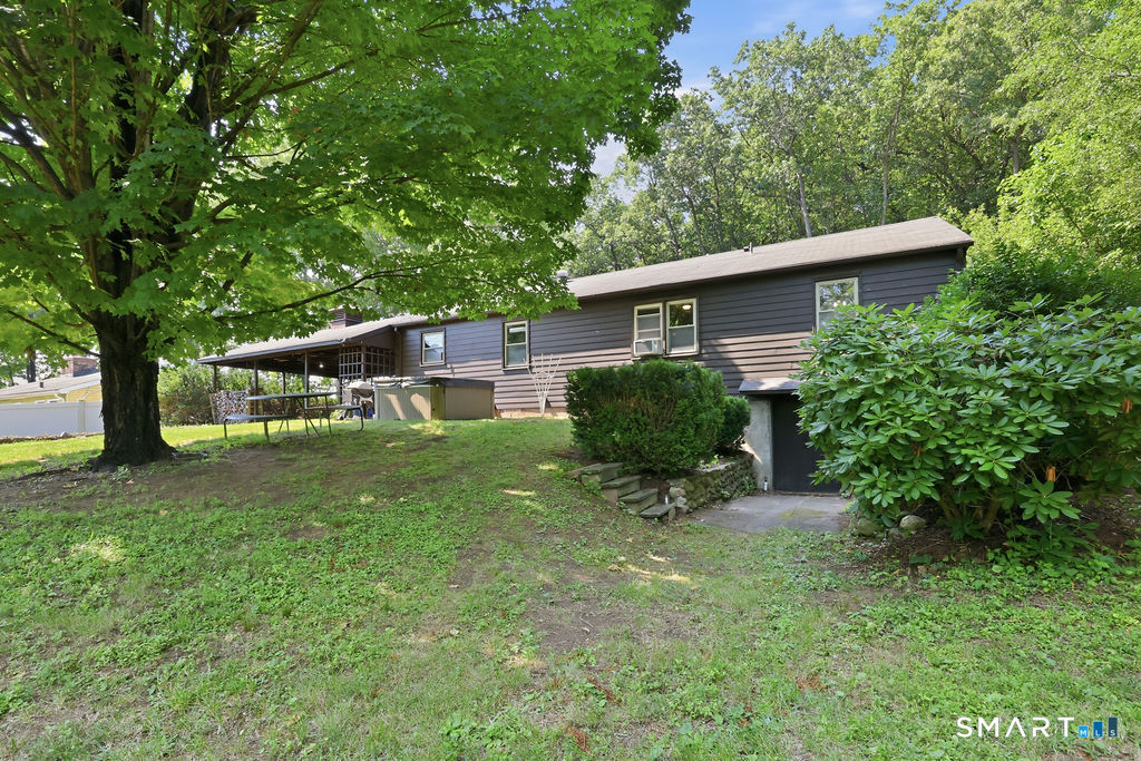 630 South Elm Street Wallingford, CT 06492 - Photo 4 of 30 a front view of house with yard and green space