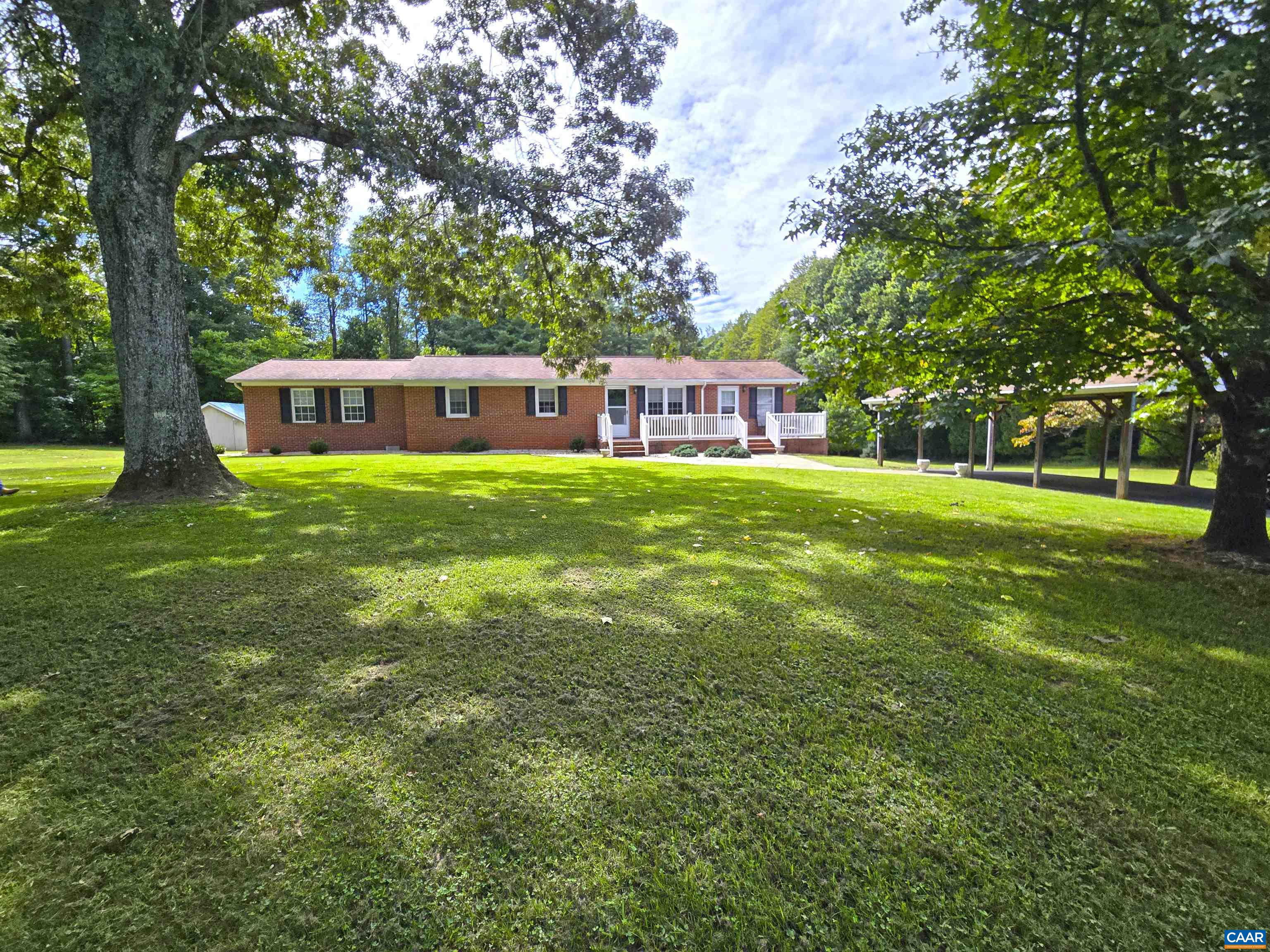5390 Buffalo Road Dillwyn, VA 23936 - Photo 1 of 22 a front view of a house with a garden