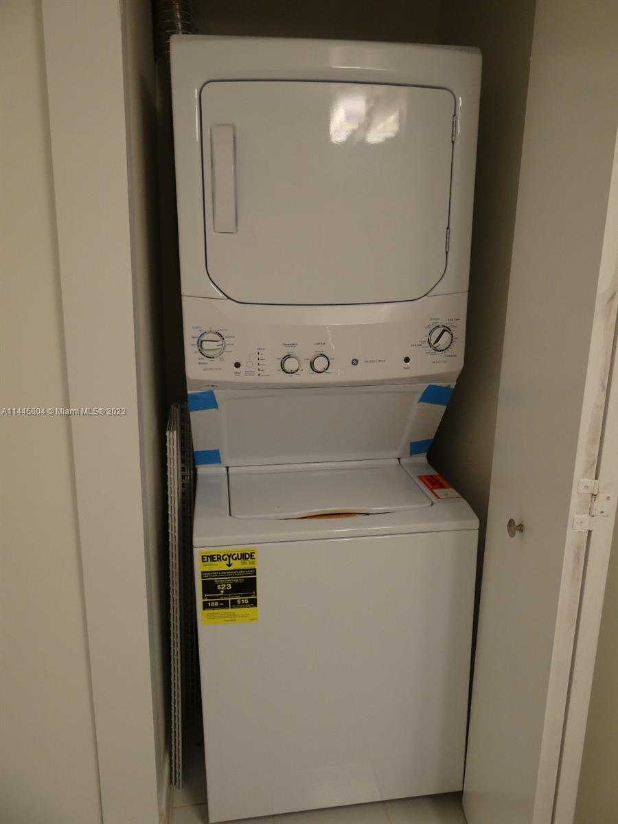 Grapeland Heights Miami, FL 33125 - Photo 17 of 36 a utility room with dryer and washer