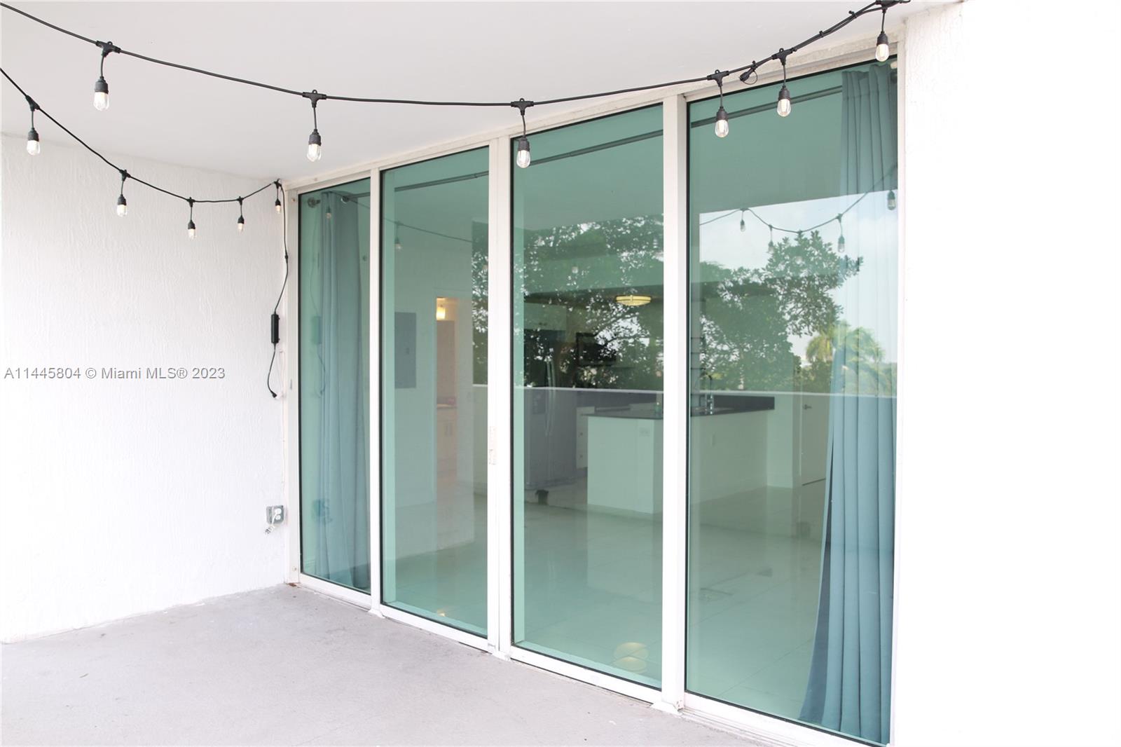 Grapeland Heights Miami, FL 33125 - Photo 20 of 36 a view of a bathroom with a glass door
