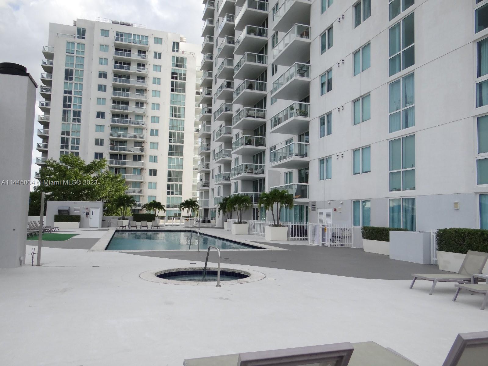 Grapeland Heights Miami, FL 33125 - Photo 25 of 36 a living room with a couch