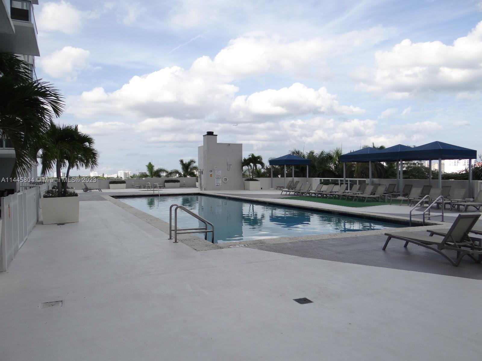 Grapeland Heights Miami, FL 33125 - Photo 28 of 36 a view of swimming pool with outdoor seating