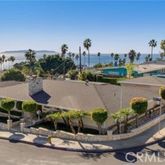 a view of a chairs and table in a patio