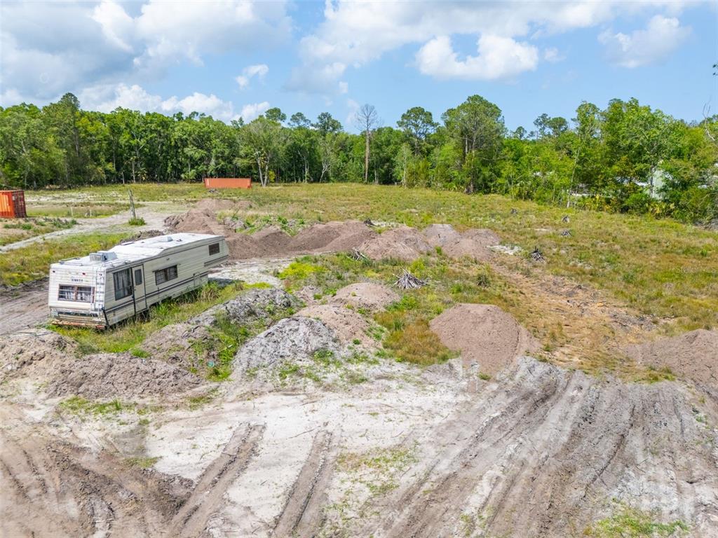190 Pine Tree Lane Bunnell, FL 32110 - Photo 1 of 12 a view of a yard with an outdoor space