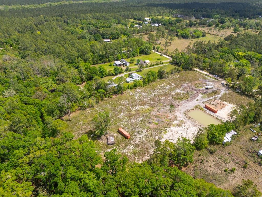 190 Pine Tree Lane Bunnell, FL 32110 - Photo 4 of 12 a view of a garden with a tree