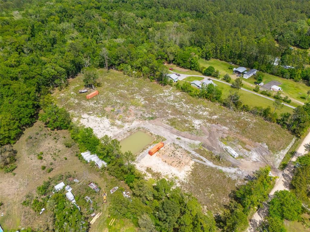 190 Pine Tree Lane Bunnell, FL 32110 - Photo 5 of 12 a view of a tree with a yard