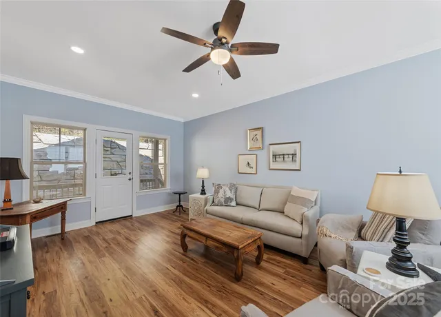 a living room with furniture and a window