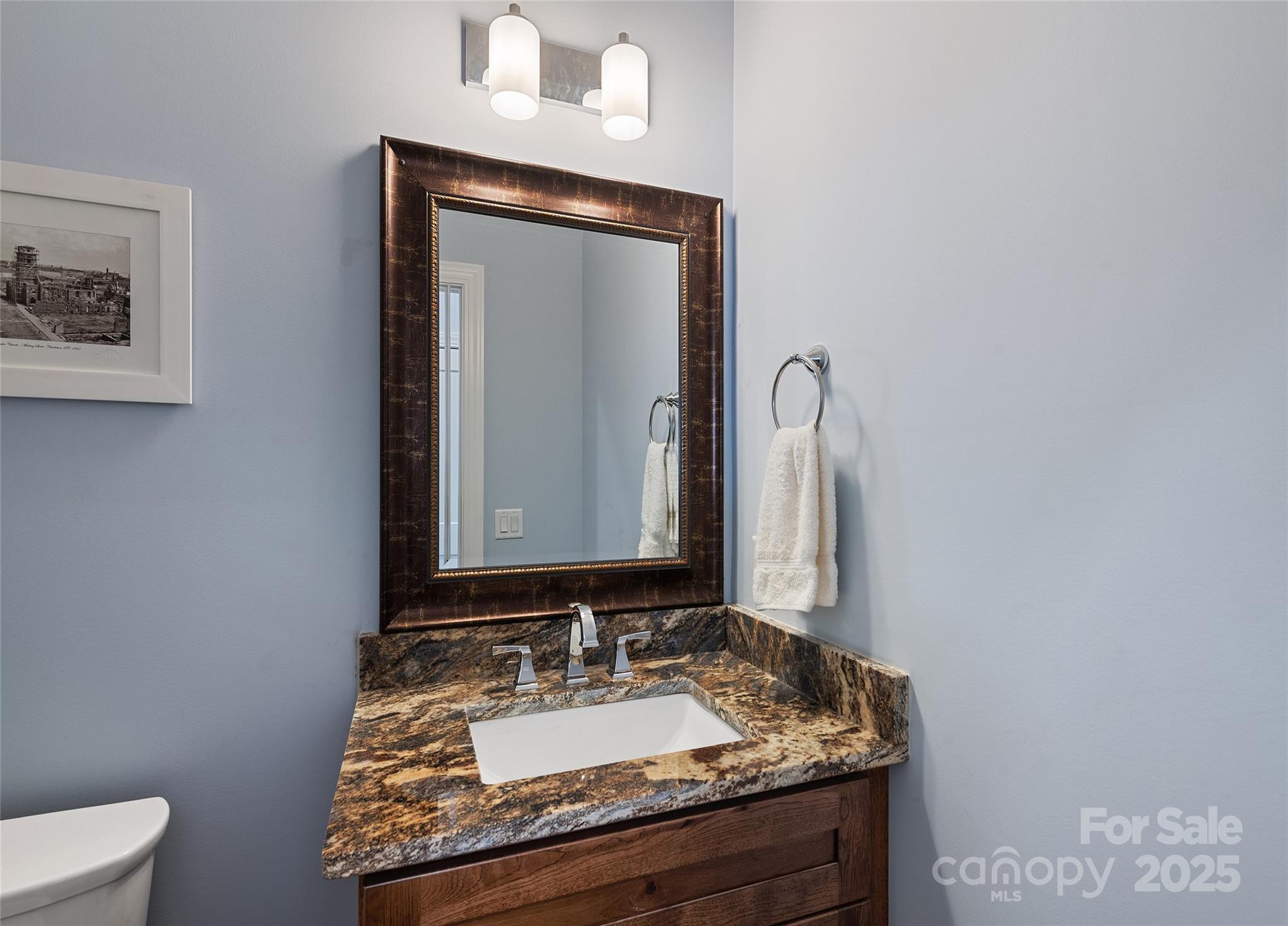 85 Garnet Spg Lane Waynesville, NC 28785 - Photo 16 of 36 a bathroom with a granite countertop sink and a mirror
